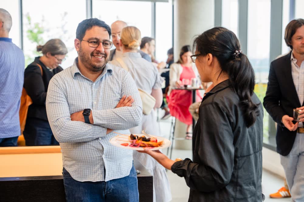 Attendees connecting during a business event.